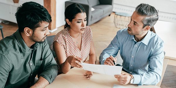 CarsonMX_Couple-Looks-at-Finances-with-Advisor