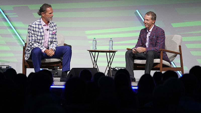 Ron Carson and Paul West speaking at Excell 2023